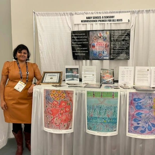 Artists posing with work
